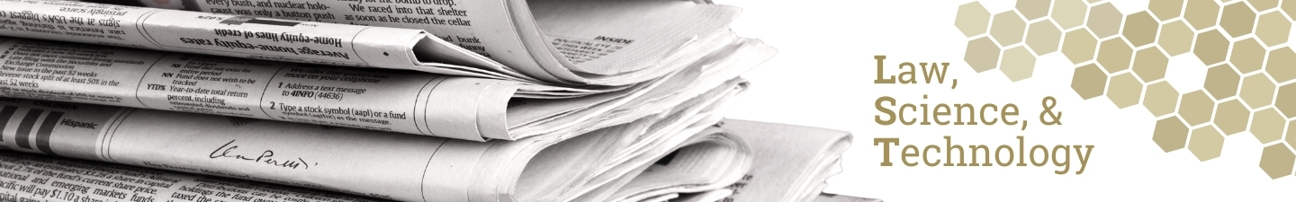 Stack of newspapers next to the LST honeycomb logo.